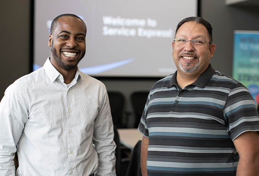 Two Service Express Employees Smile
