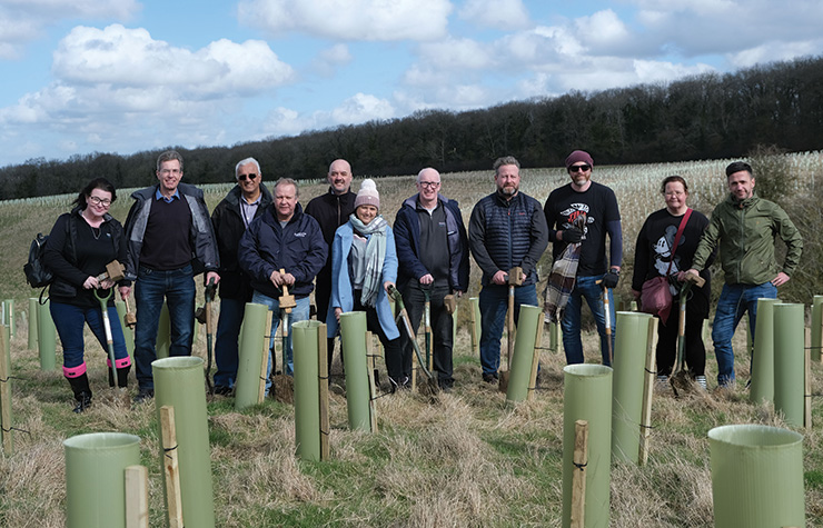An image of Service Express UK employees volunteering at the Forest of Marston Vale
