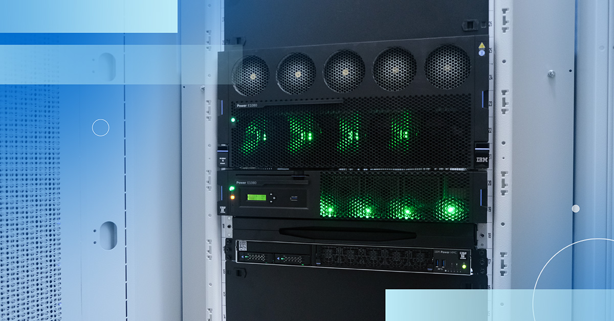 An image of IBM equipment close up with green lights illuminated