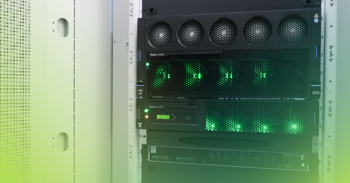 An image of IBM equipment close up with green lights illuminated with a green gradient overlay