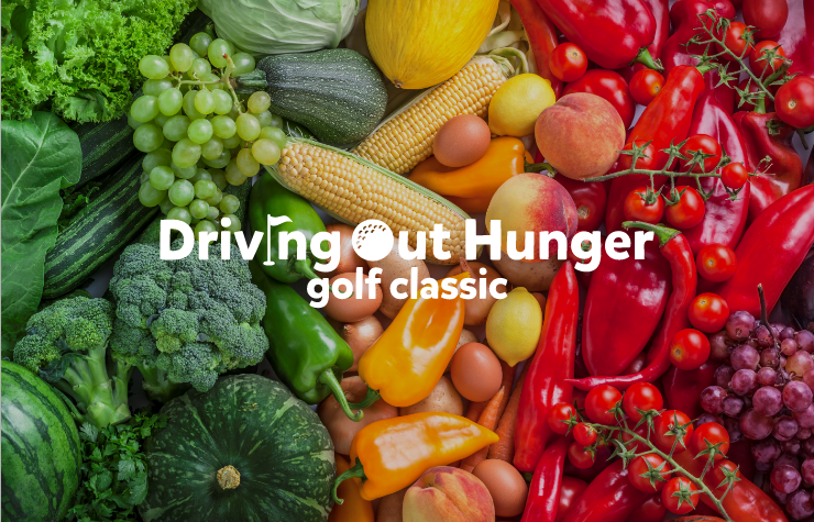 Driving out hunger golf classic logo over an image of colorful fruits and vegetables