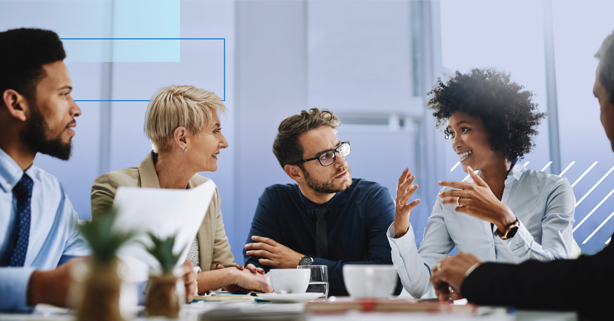 Four Professionals Drinking Coffee in Meeting